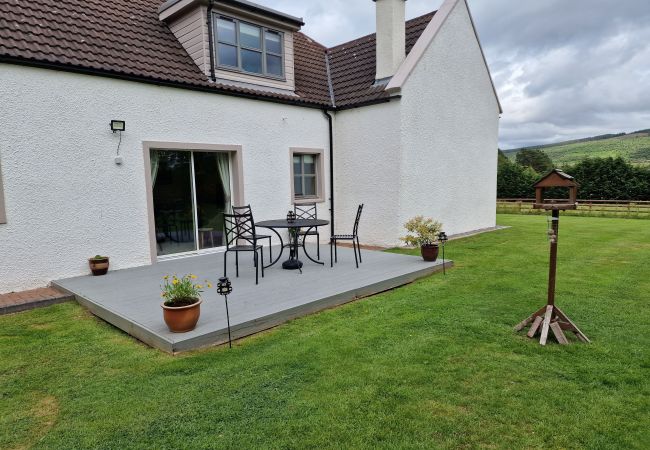 Outdoor dining space at a Highland holiday cottage
