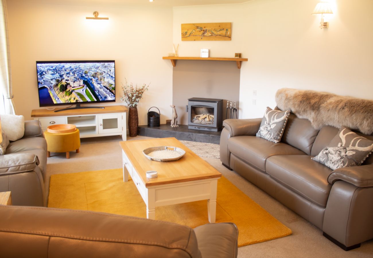 Lounge with luxury furnishings in Inverness holiday cottage