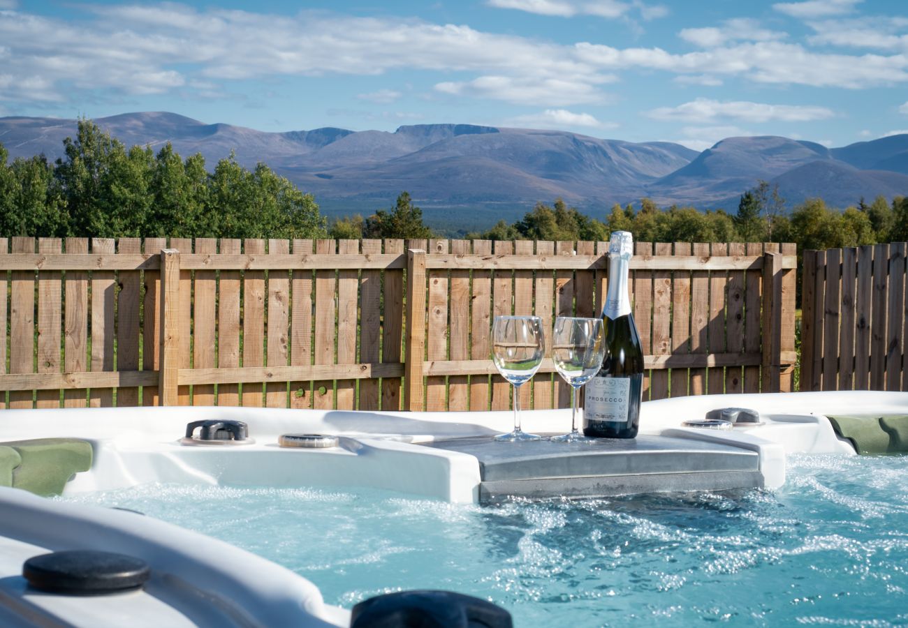 View of Cairngorms from a hot tub at an Aviemore lodge