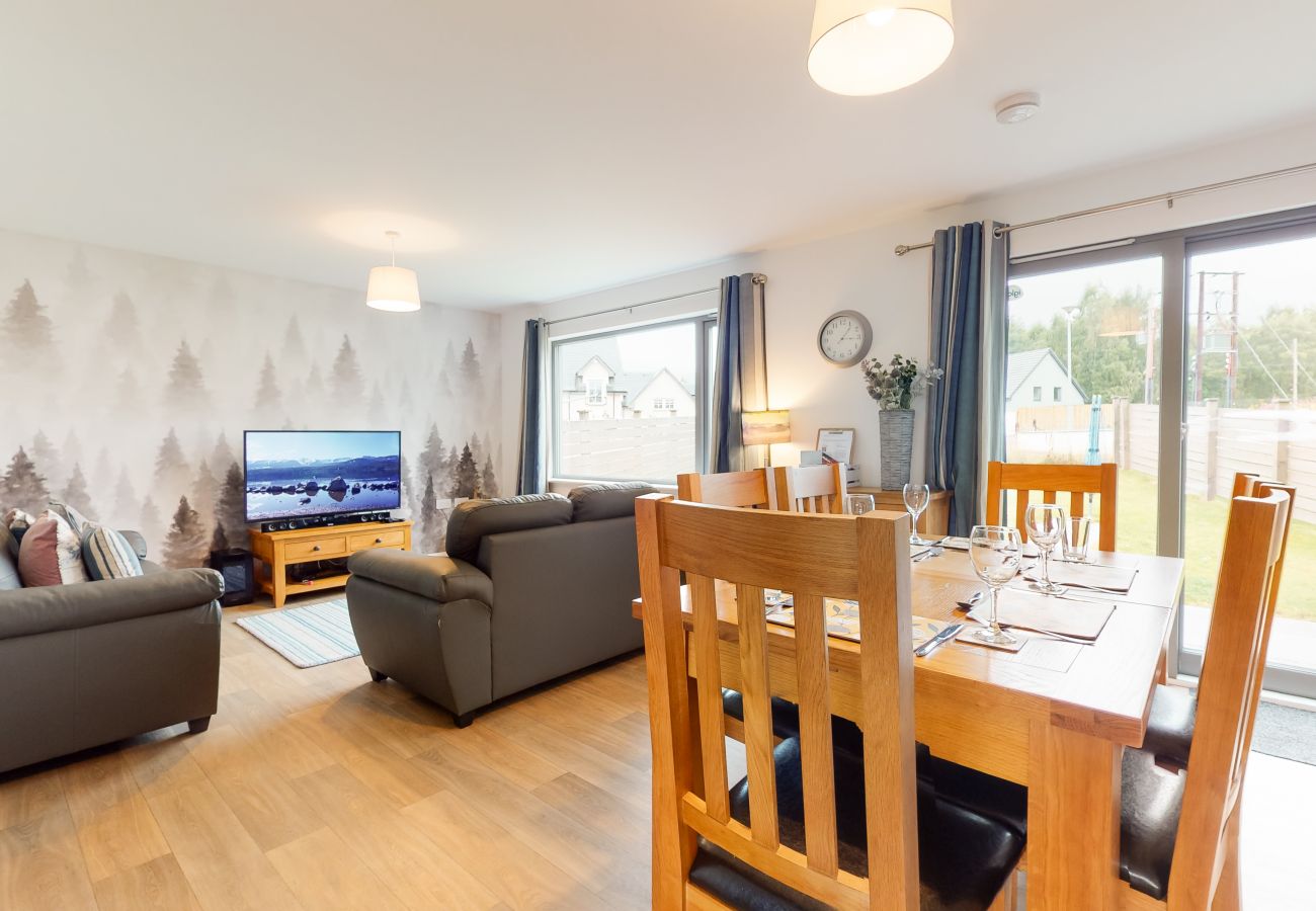Living and dining space in an Aviemore self catering property