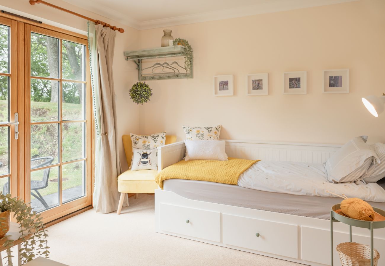Bright airy bedroom in Cairngorm holiday property
