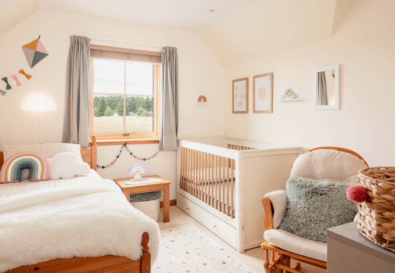 Single bed plus full-size cot in Cairngorm holiday cottage