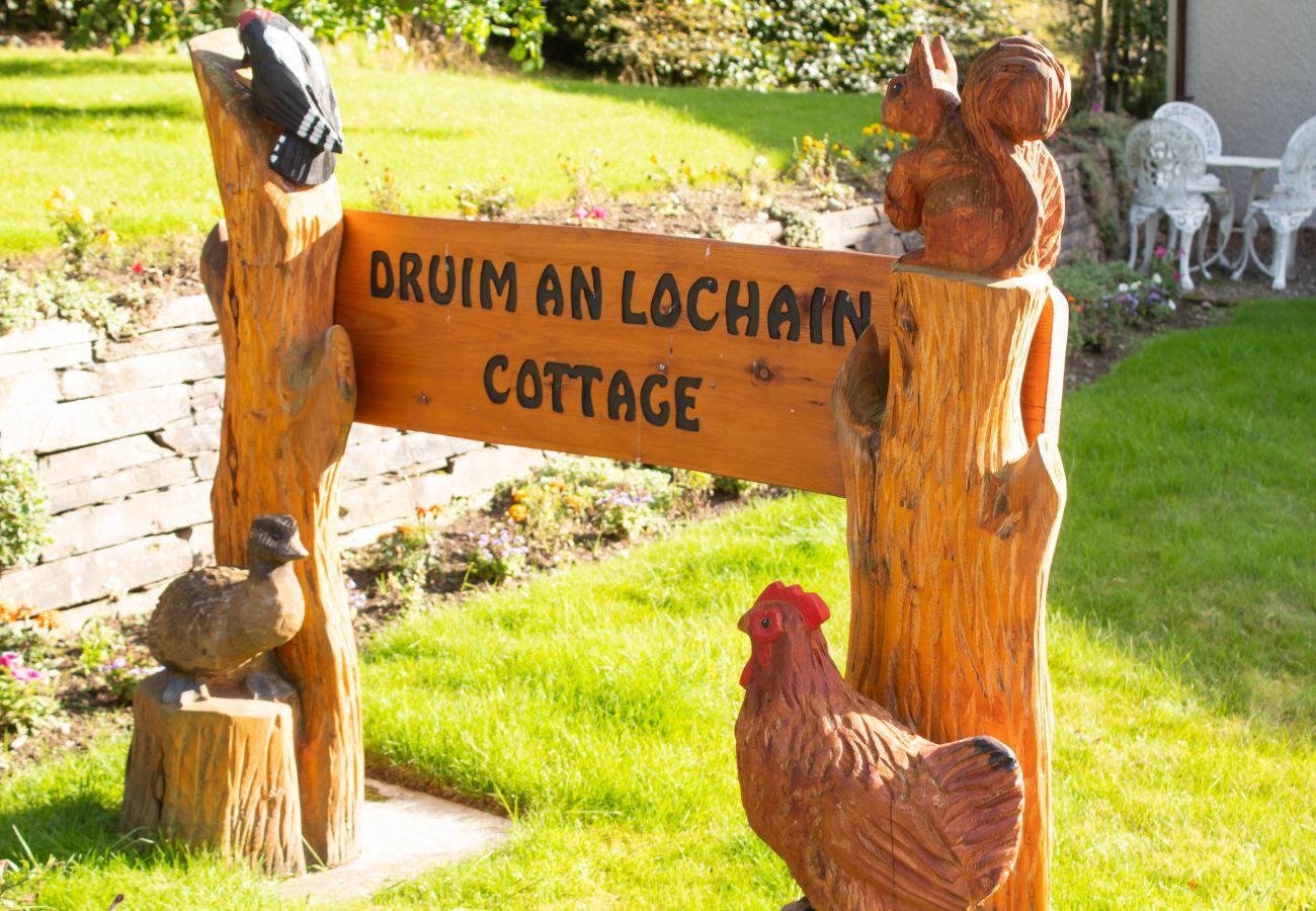 Sign for holiday cottage in Cairngorm National Park