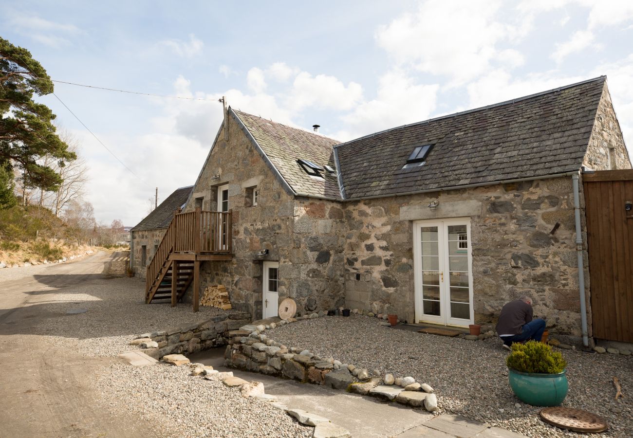 A historic stone building now a luxury holiday property near Nethy Bridge