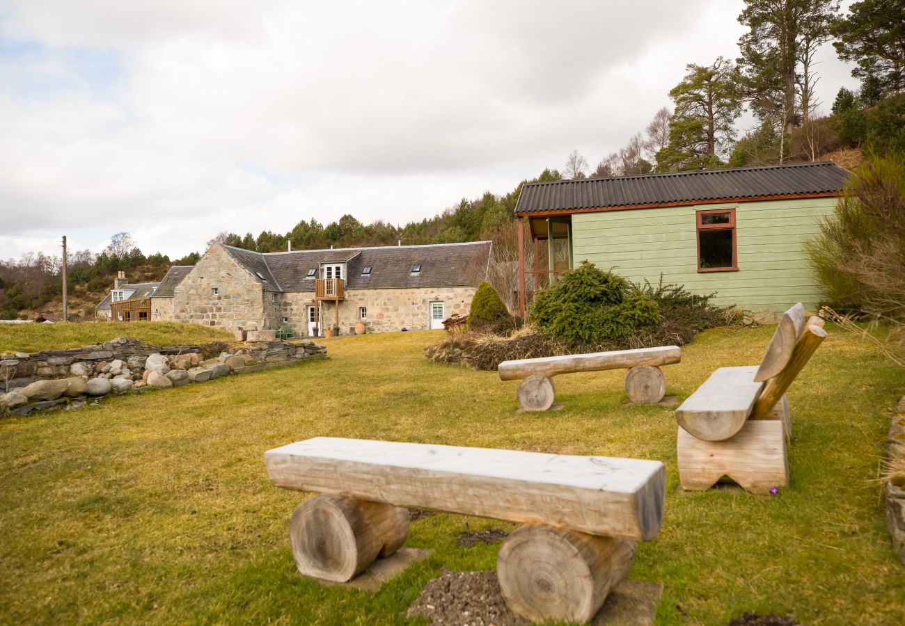 Garden with seating area at Highland self catering property