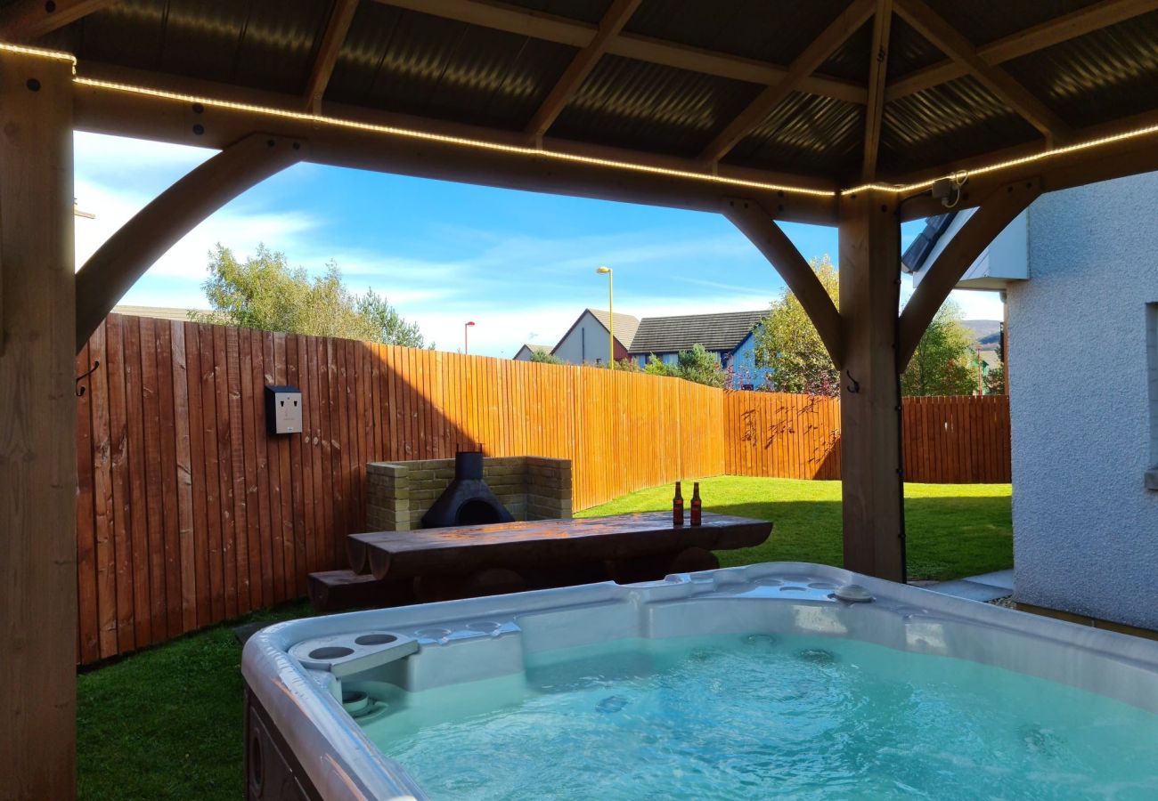 Jump in the hot tub at Eagle Lodge , Aviemore.