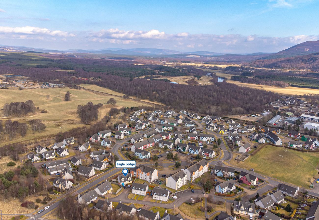 High level drone photo showing Eagle Lodge and north end of Aviemore