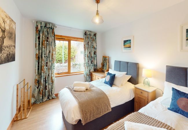 Twin room in an Aviemore holiday home