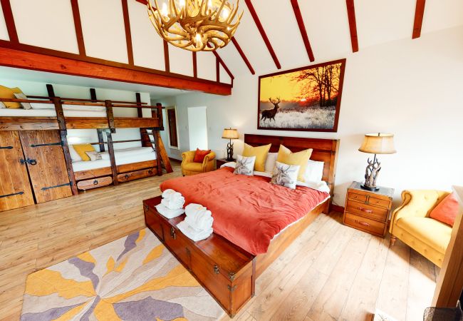Master bedroom in large Cairngorm holiday lodge 