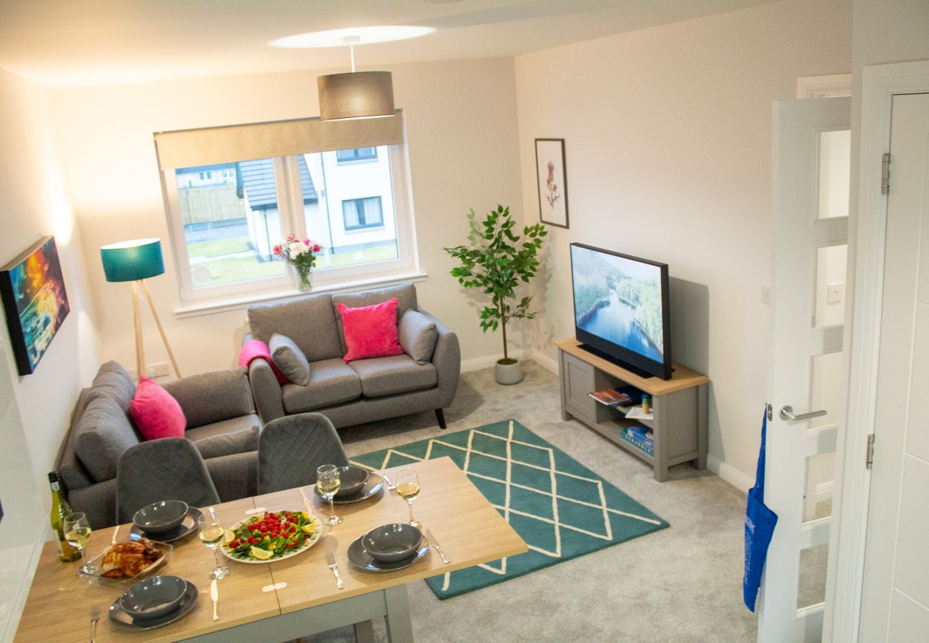 Living room and dining table at 26 Ben Avon