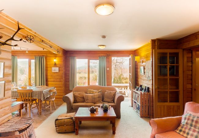 Living room with door out to patio area