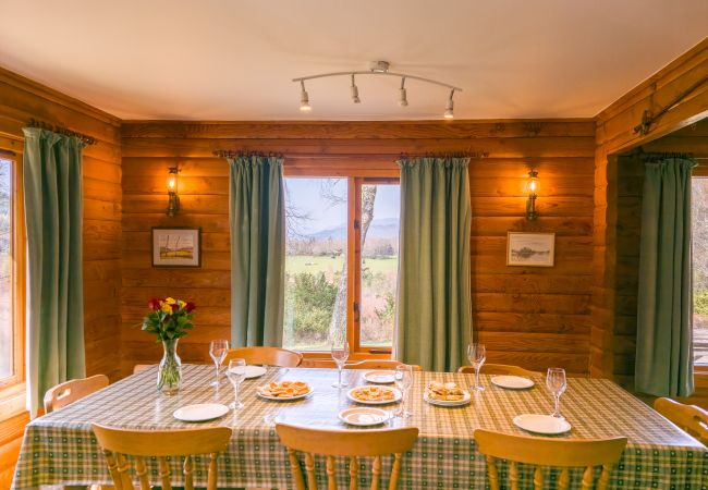 Dining space in a Highland log cabin
