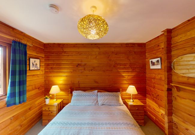 Double bedroom in a Highland log cabin