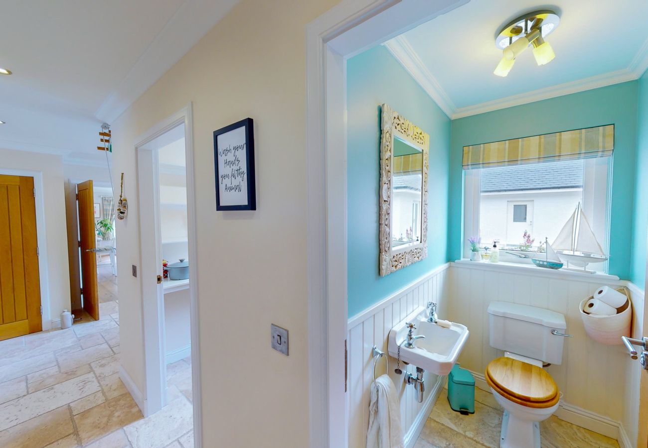 Toilet, pantry and laundry room at The Bellhouse