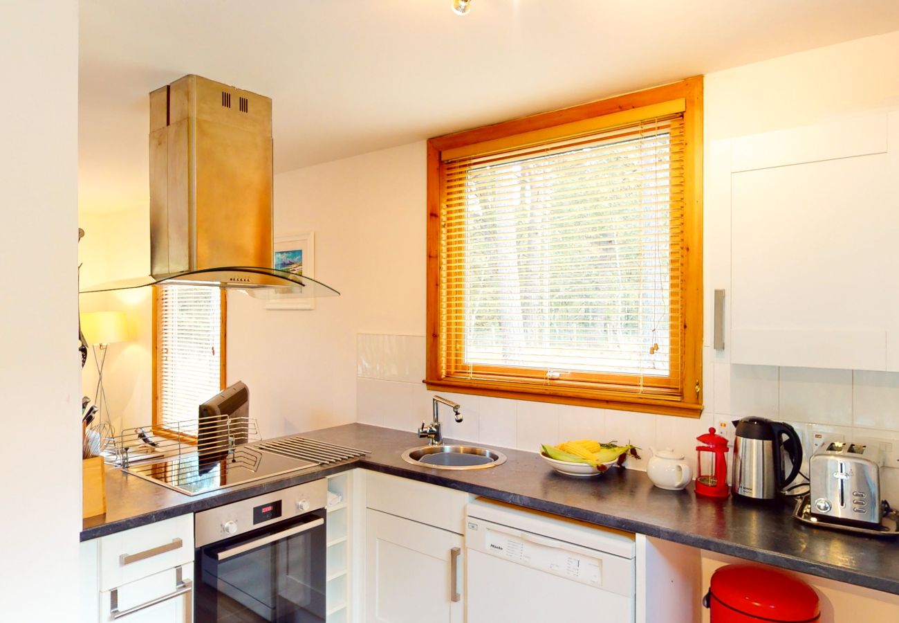 Modern kitchen in a Nethy Bridge holiday home Taigh M'athair