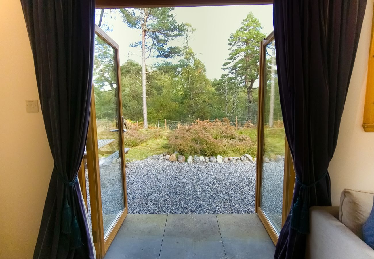 Taigh M'athair holiday home patio doors open to outside