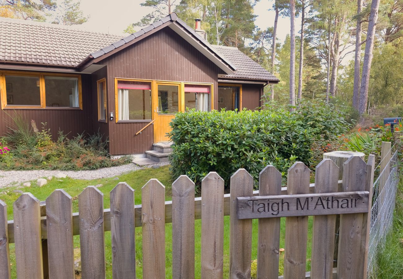 Outside of Taigh M'athair holiday home in Nethy Bridge