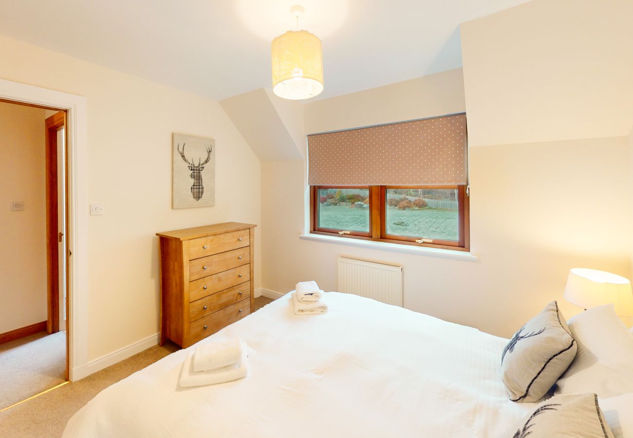 Upstairs double bedroom in an Aviemore holiday home