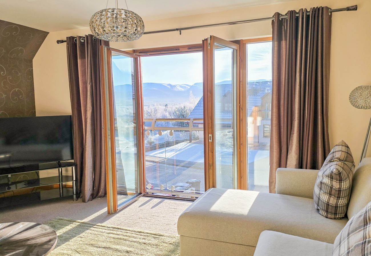 Living Room with scenic view in an Aviemore Holiday Home