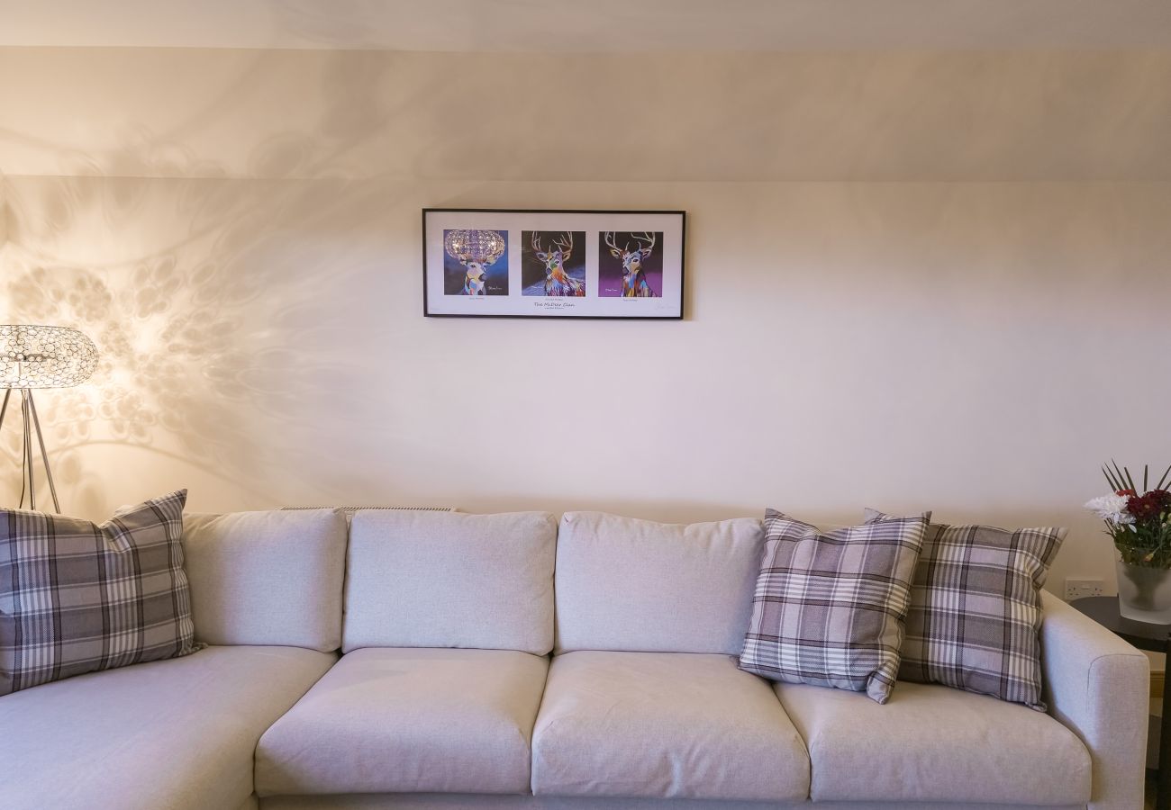 A large sofa in an Aviemore lodge