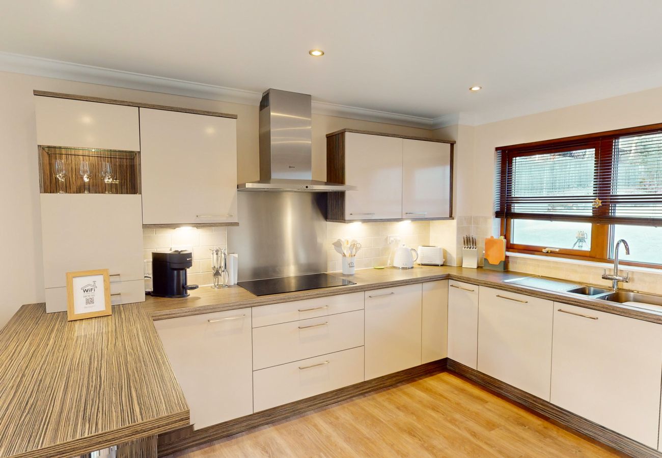   Spacious Kitchen with Modern Amenities in Aviemore Lodge 