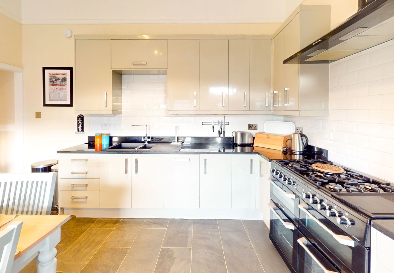 Modern kitchen and dining area in a Laggan holiday home