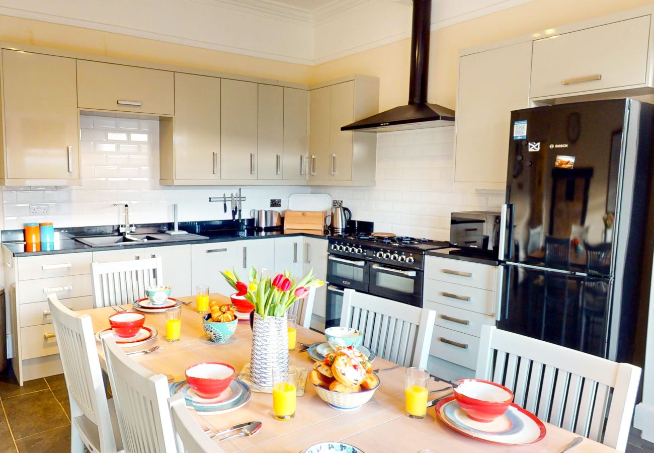 Modern kitchen and dining area in a Laggan holiday home