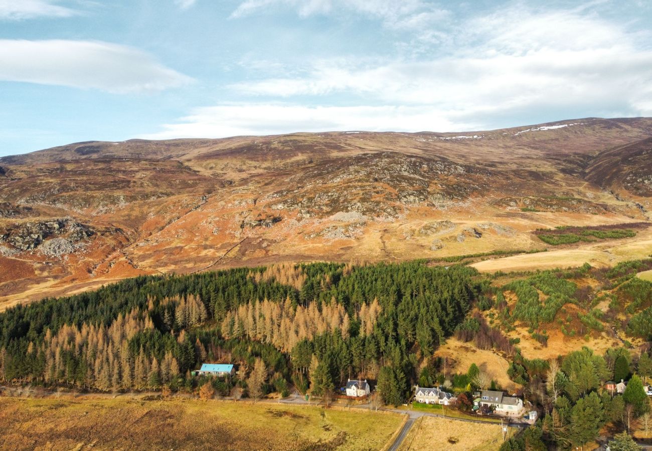 Aerial view of a holiday home in Laggan, surrounded by the Scottish Highlands