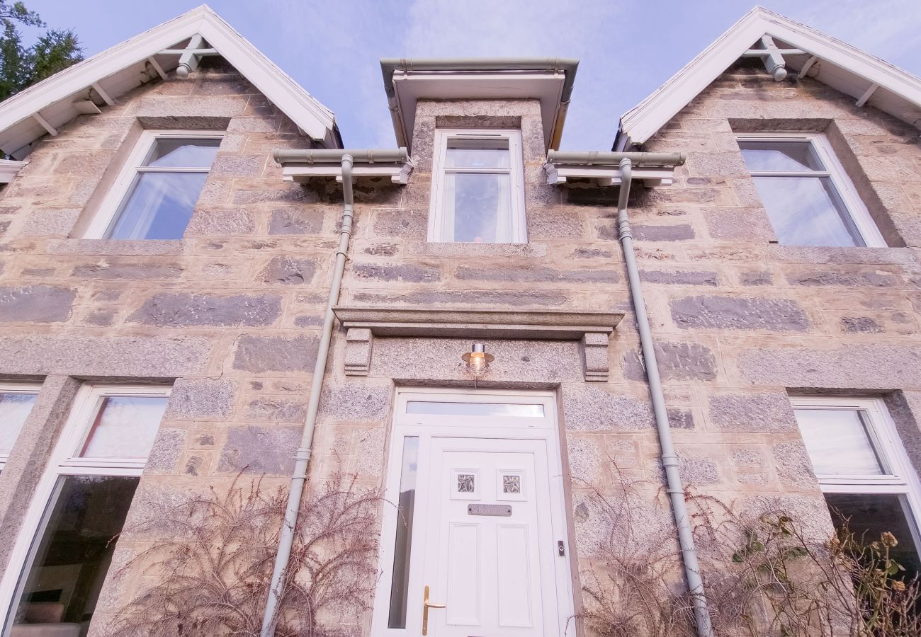 Stone-built entrance of a holiday home in the Scottish Highlands