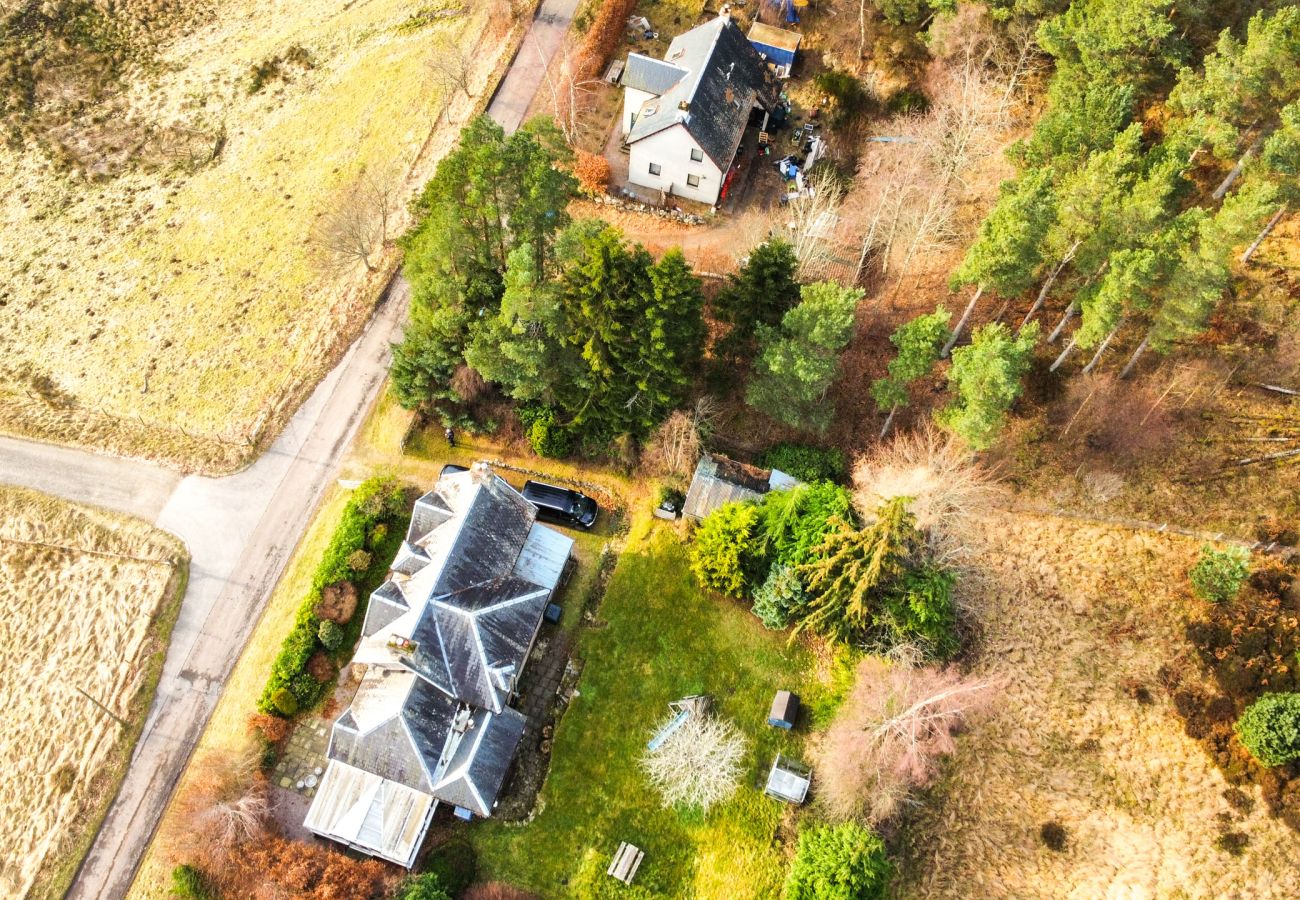 Aerial view of a holiday home in Laggan, surrounded by the Scottish Highlands