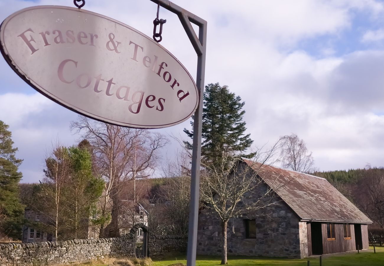 Sign for Fraser and Telford Cottages near Aviemore