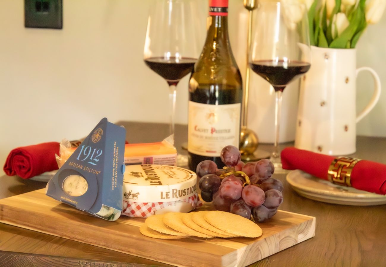 Cheese and wine in a small Cairngorm holiday cottage