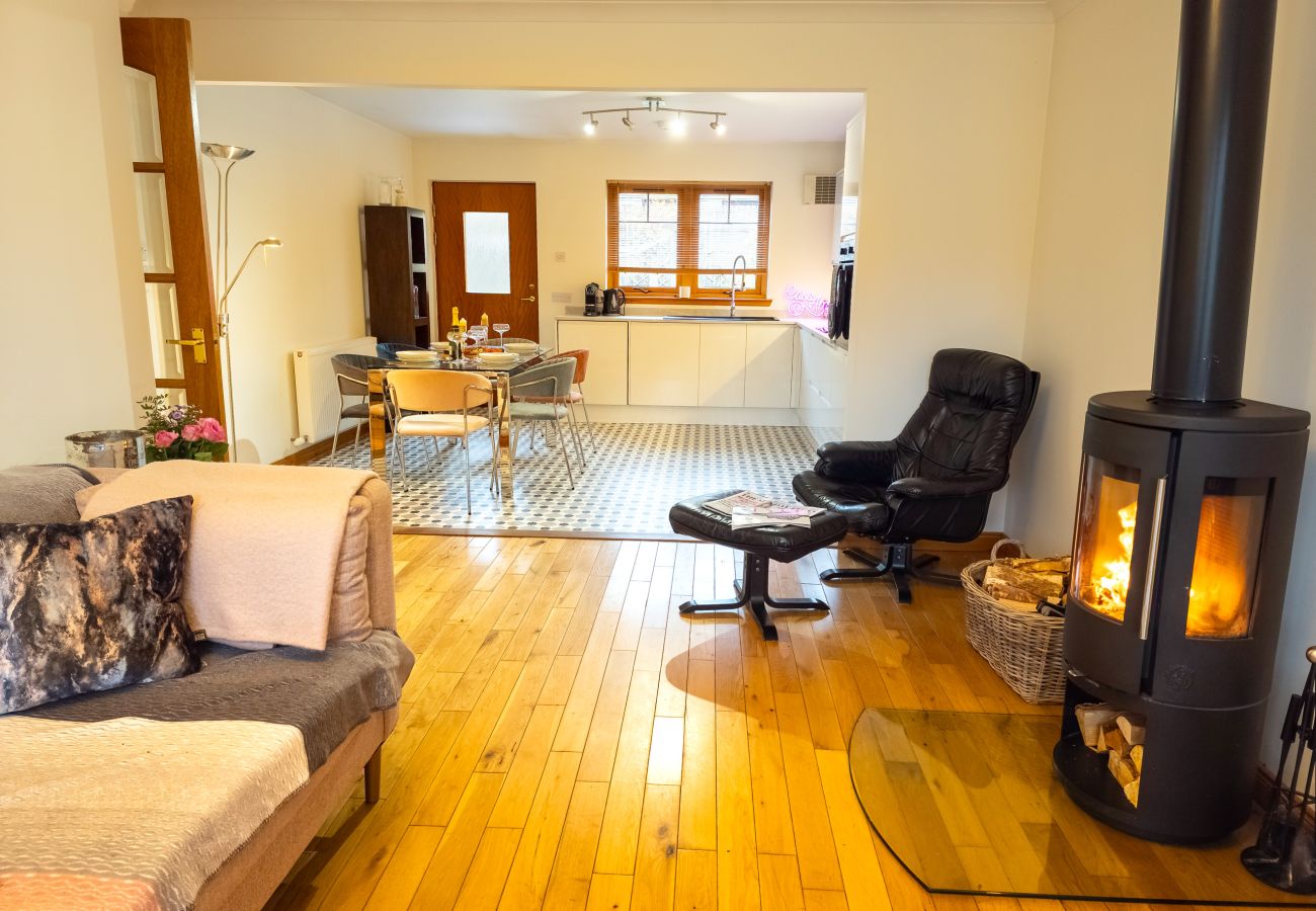 Living room with fireplace Aviemore Highlands