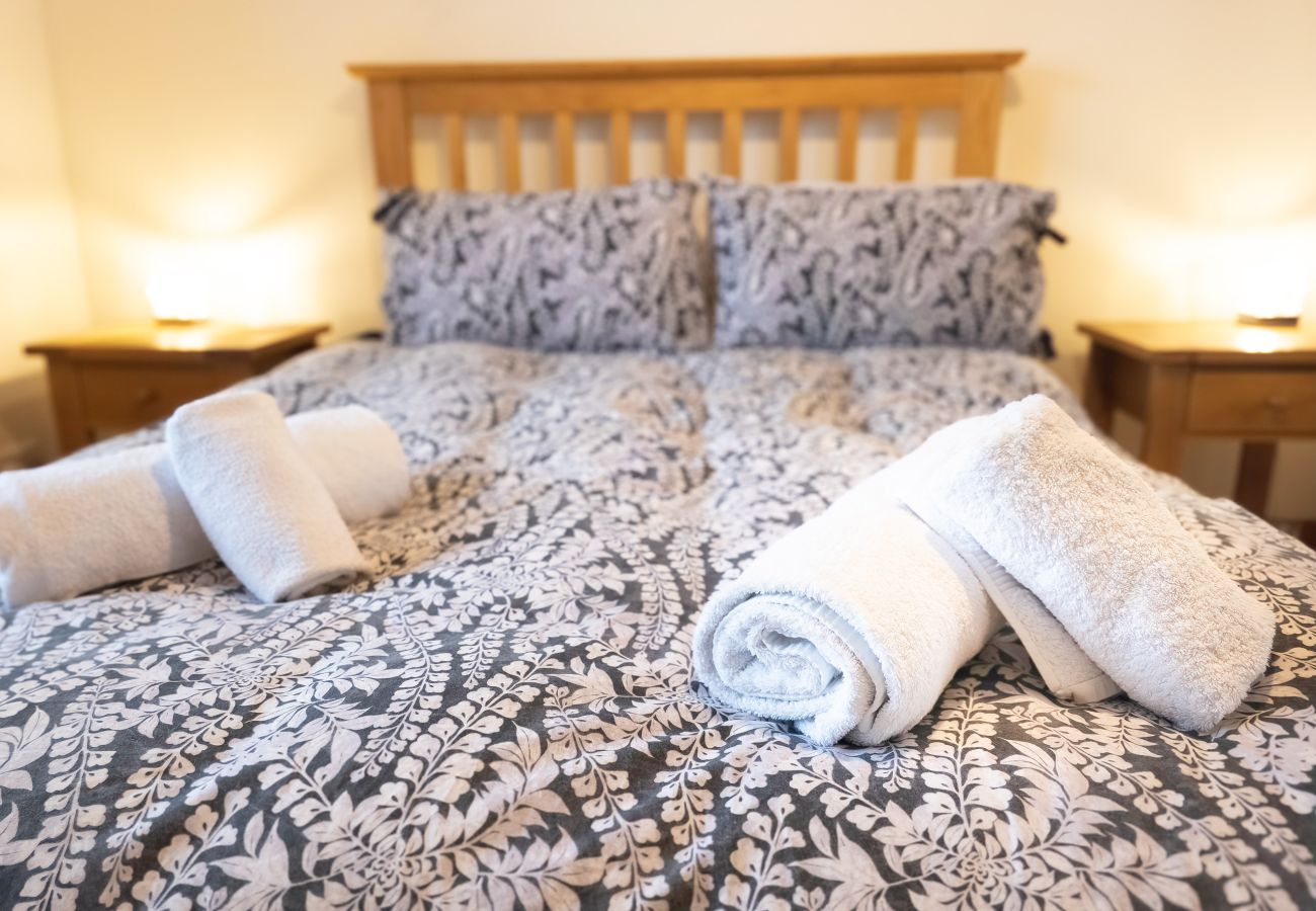 Double bed with cosy bedding Aviemore