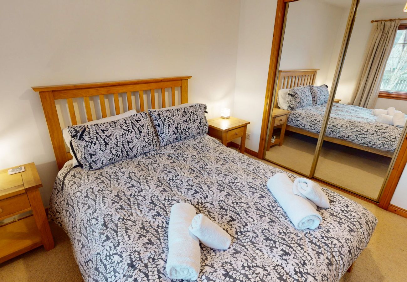 Double bed with cosy bedding Aviemore