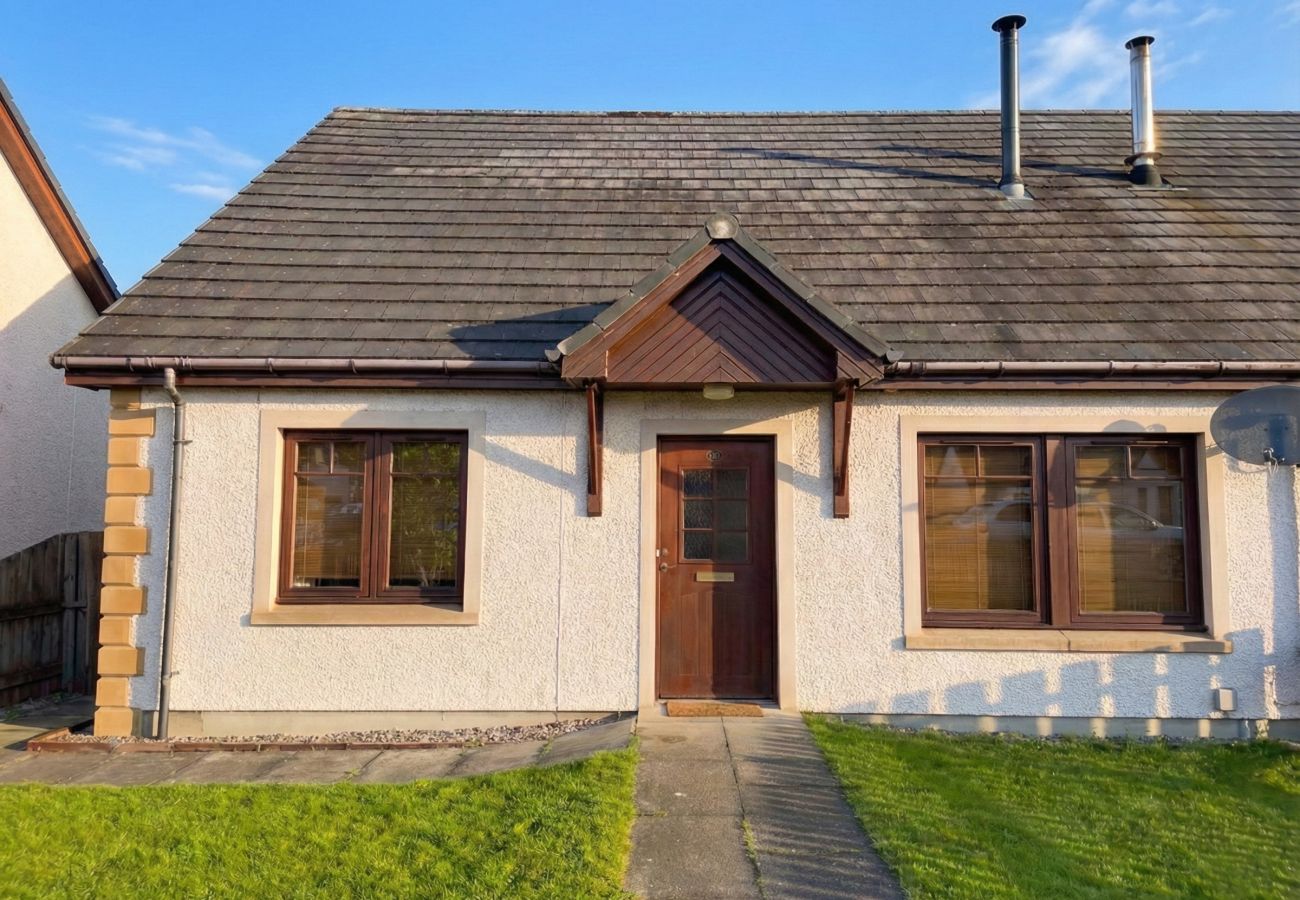 The front of the holiday home showing path and front door