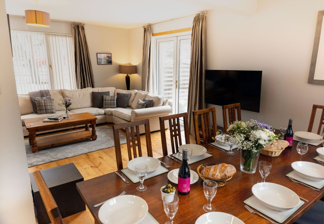 Table setting with glasses and flowers