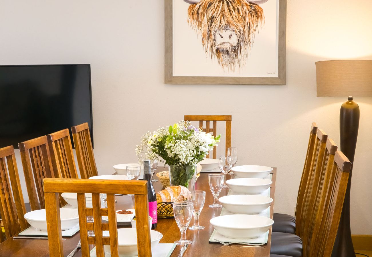 Table setting with glasses and flowers