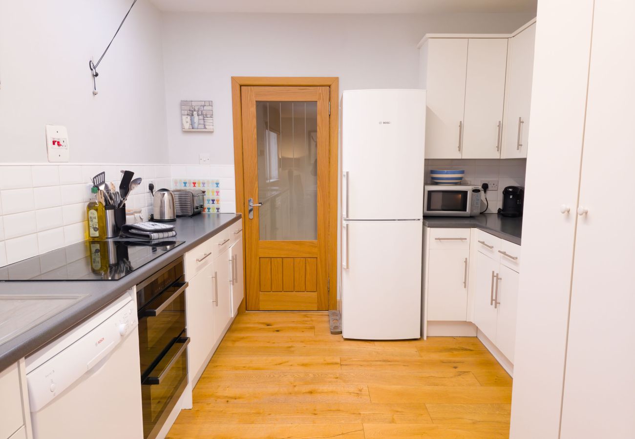 Kitchen with appliances and ample workspace