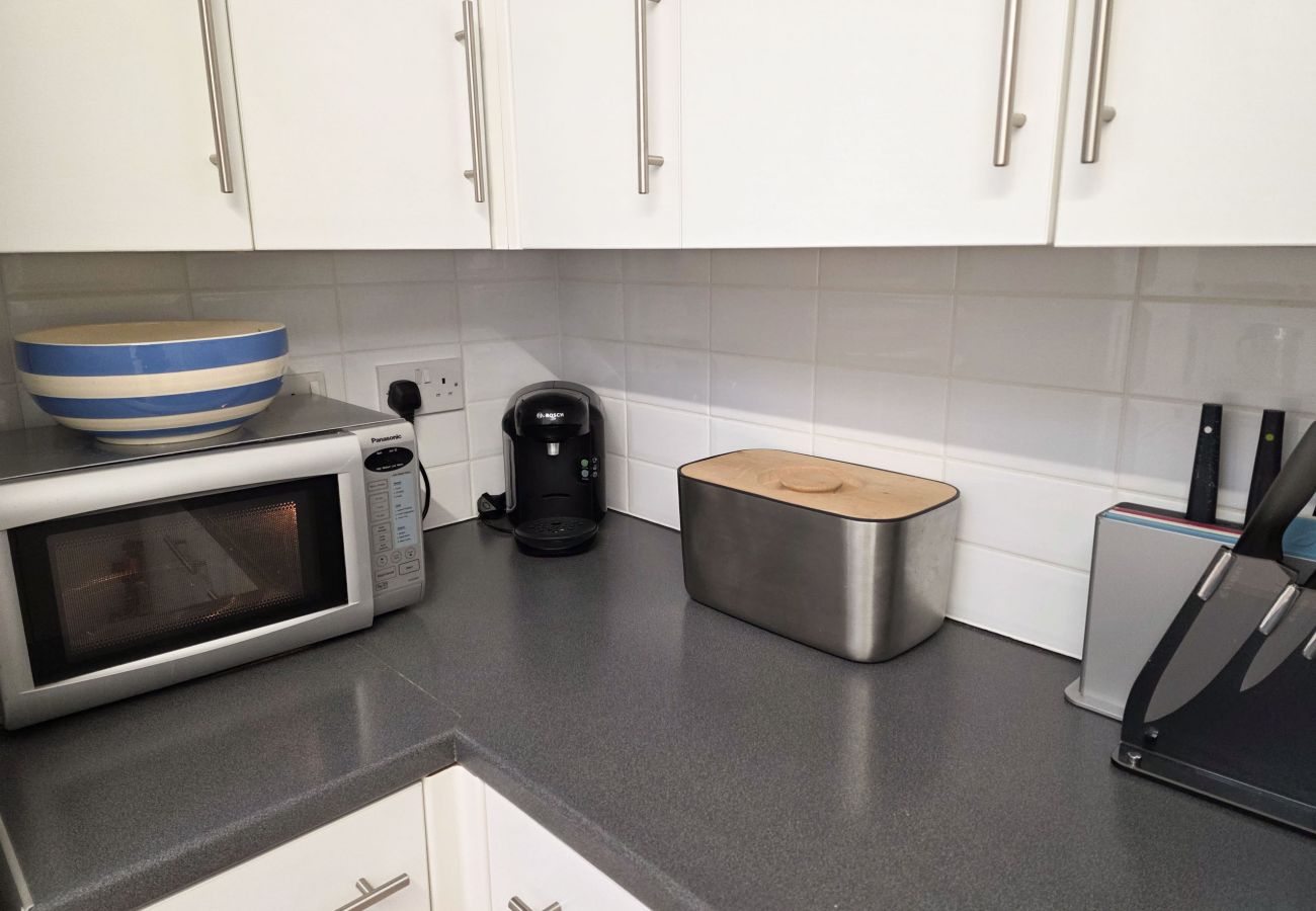 Kitchen with appliances and ample workspace