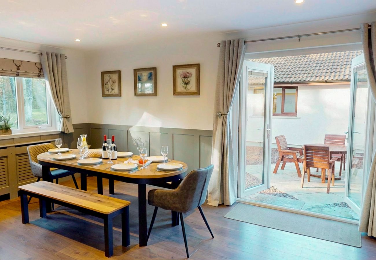 Elegant family dining table with seating for 8 with patio access