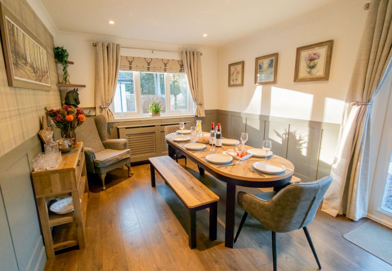 Family dining space with comfortable seating and access to the outdoor patio.