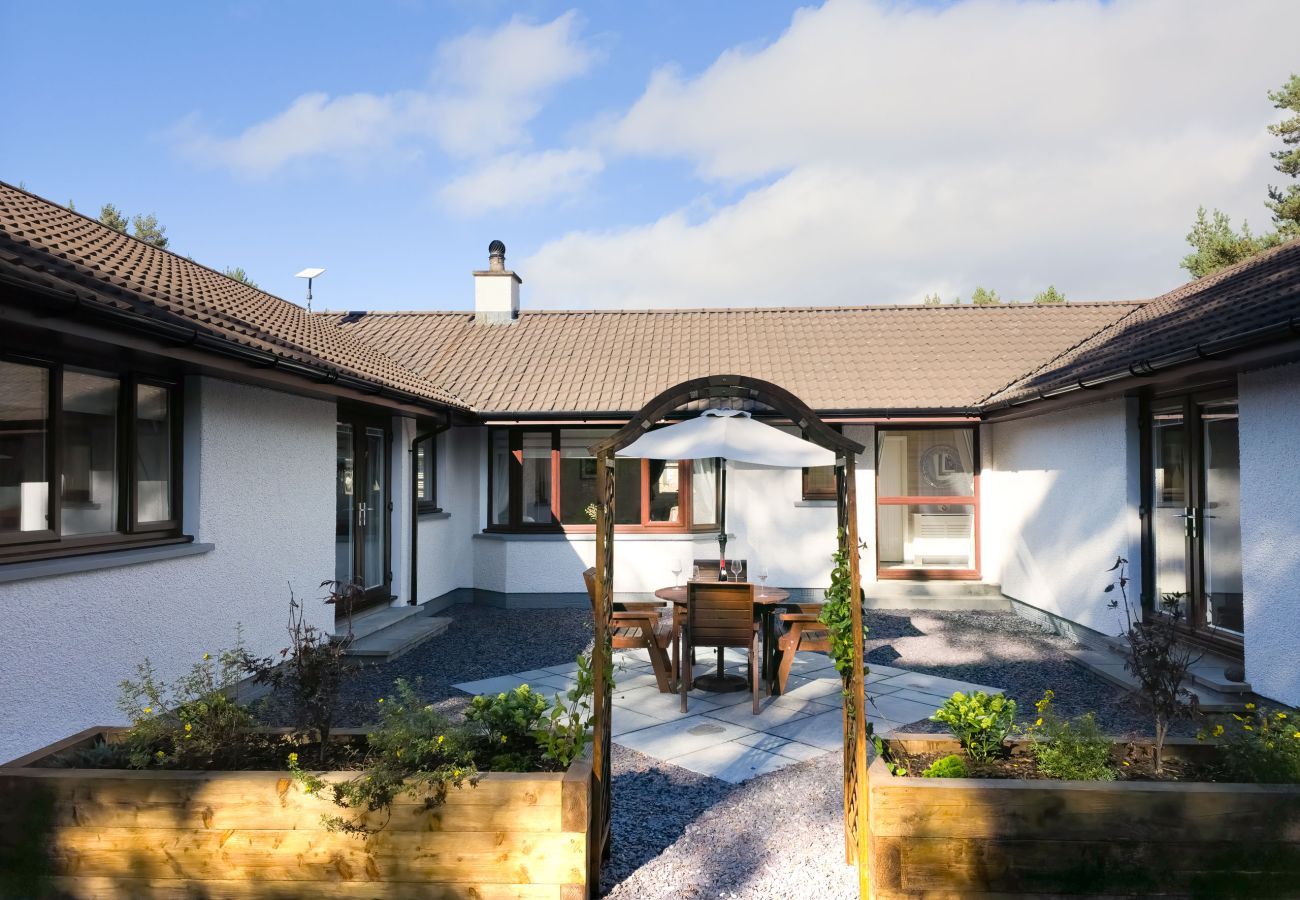 Private inner courtyard patio with potted plants.
