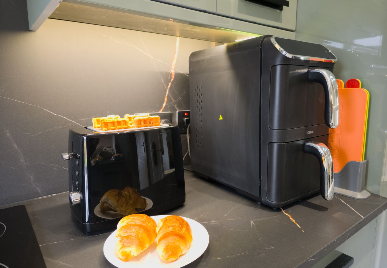 Kitchen appliances including toaster and air fryer at Inverness holiday rental
